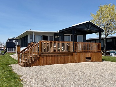 Site # 1018- Northlander Reflection- 38'X12'-Pebble Beach, Beachview Site # 1018- Northlander Reflection- 38'X12'-Pebble Beach, Beachview